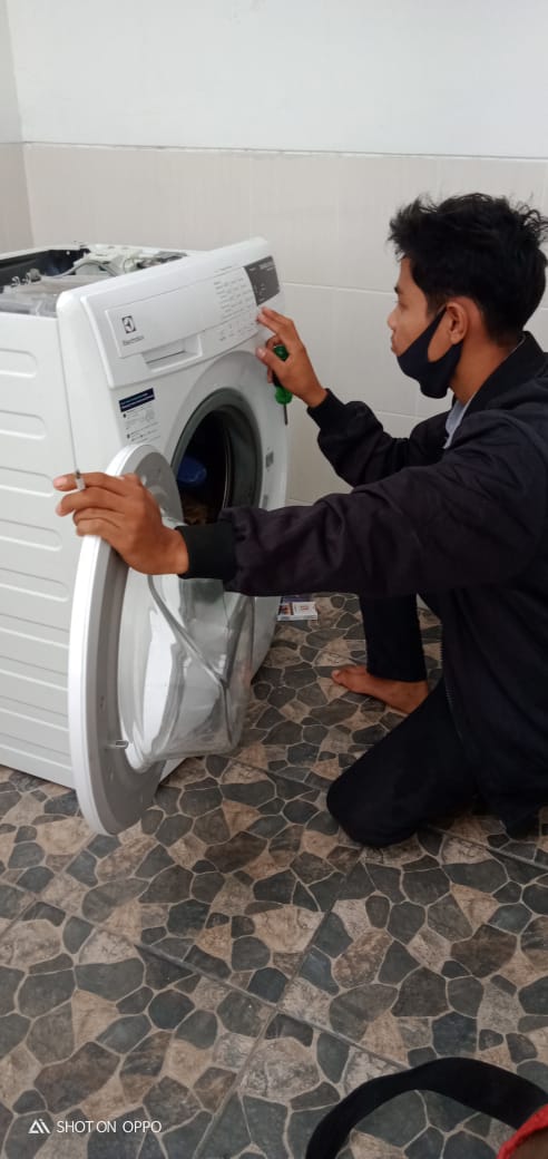 Service mesin cuci